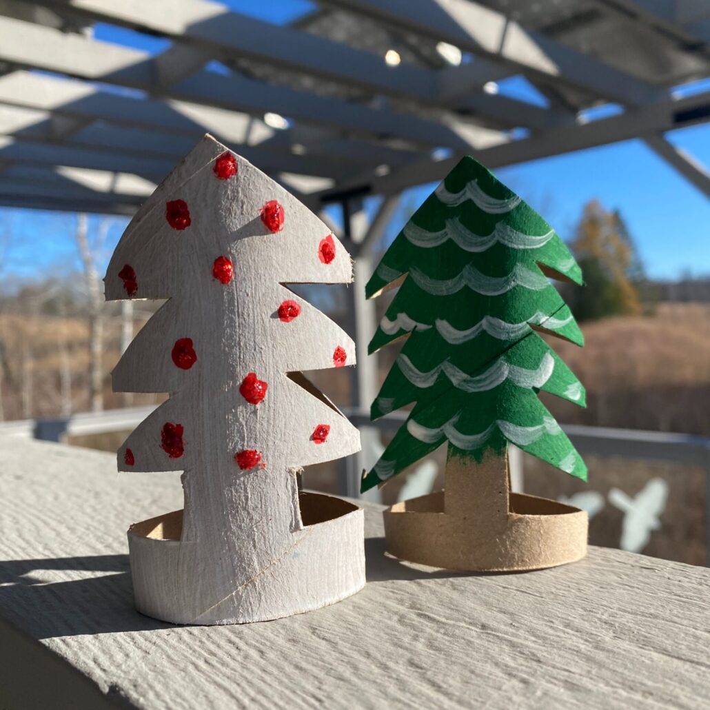 2 crafted holiday trees made from toilet paper tubes