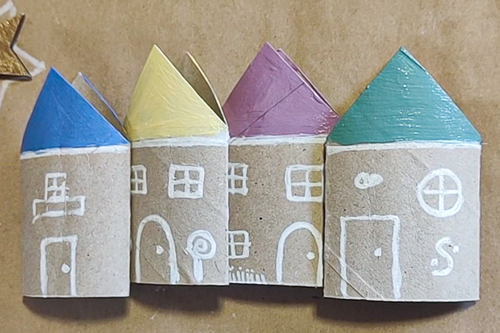 4 mini painted cardboard houses